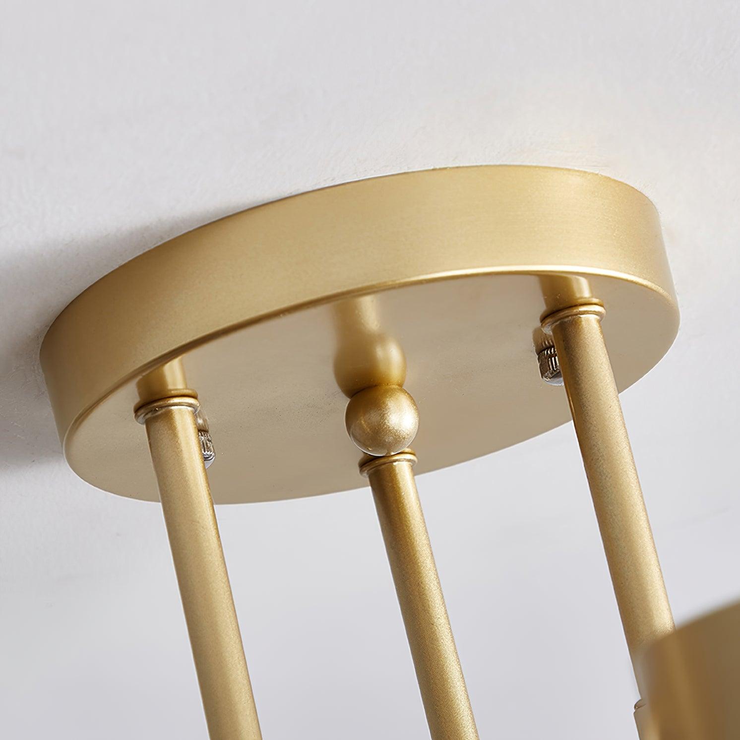 Sputnik ceiling light detail of shade and arm junction