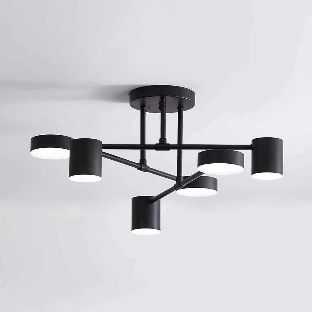 Multi-arm Sputnik ceiling light lit in a modern living room