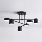 Multi-arm Sputnik ceiling light lit in a modern living room