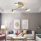 Sputnik ceiling light casting warm light over a high-ceiling room