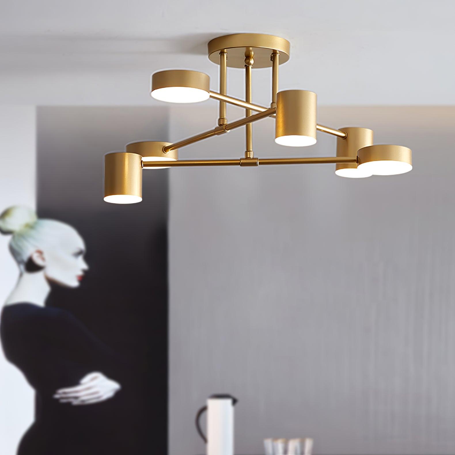 Sputnik ceiling light with white acrylic shades against a pale ceiling