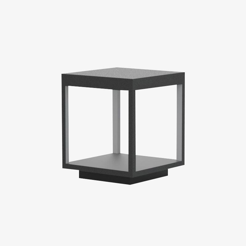 Square frame outdoor light lighting a garden path at night