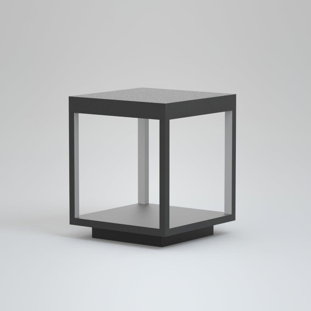Outdoor post light illuminating a walkway after dark