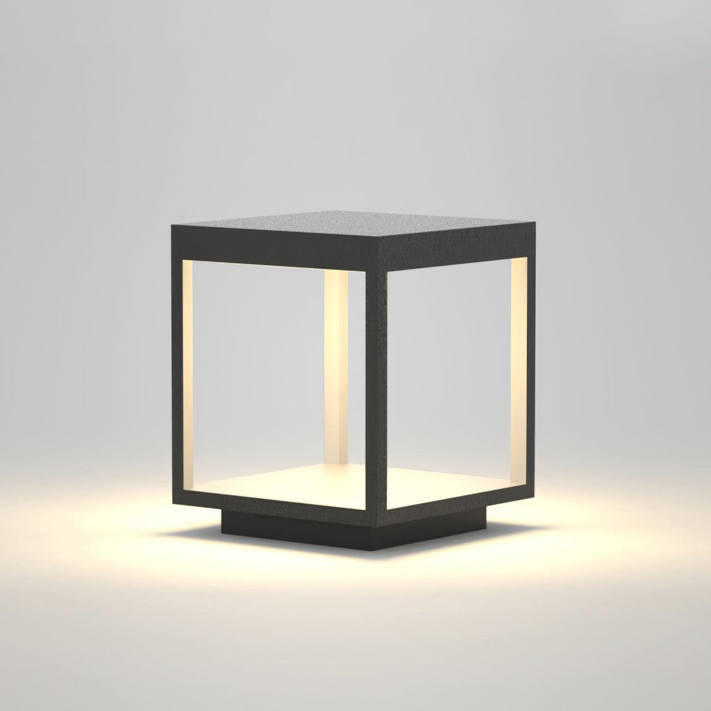 Square frame outdoor light shown lit against the evening
