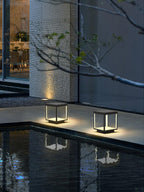 Outdoor post light with acrylic diffuser lit at night