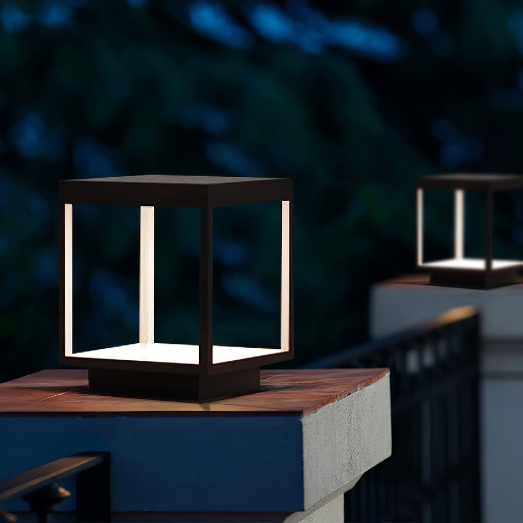 Solar outdoor post light lighting a garden corner at night