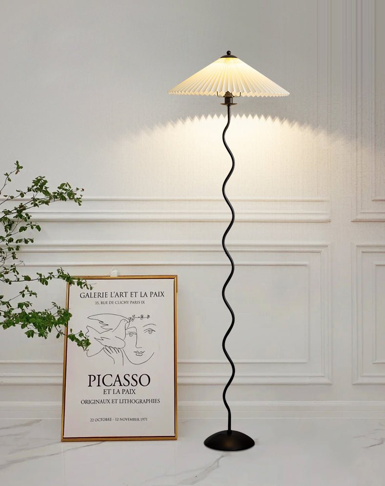 Squiggle floor lamp highlighting the sculptural curved base