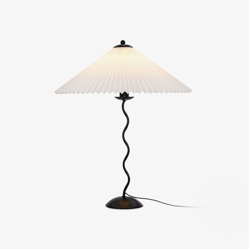 Squiggle table lamp with wavy stem on a console