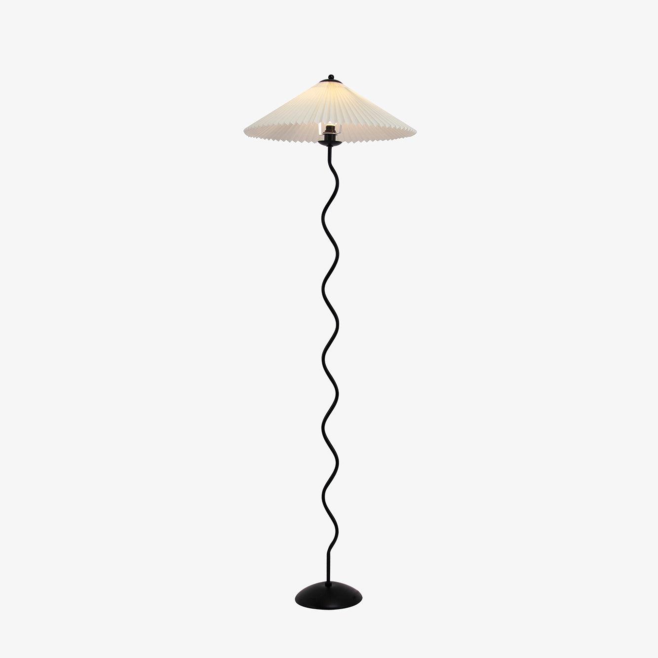 Squiggle floor lamp showing full silhouette against a wall