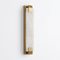 Studio shot of this Clérachic panel sconce in brass finish, its flat alabaster panel held by clips top and bottom.