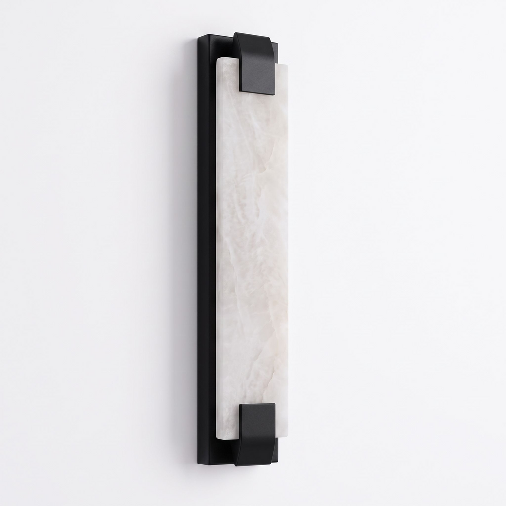 Set against white, this Clérachic panel sconce in black finish shows its alabaster panel gripped by metal clips.