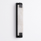 Set against white, this Clérachic panel sconce in black finish shows its alabaster panel gripped by metal clips.