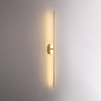 Linear sconce glowing softly in a contemporary hallway