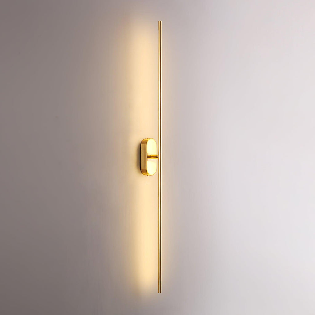 Slim wall sconce drawing a clean line of light upward