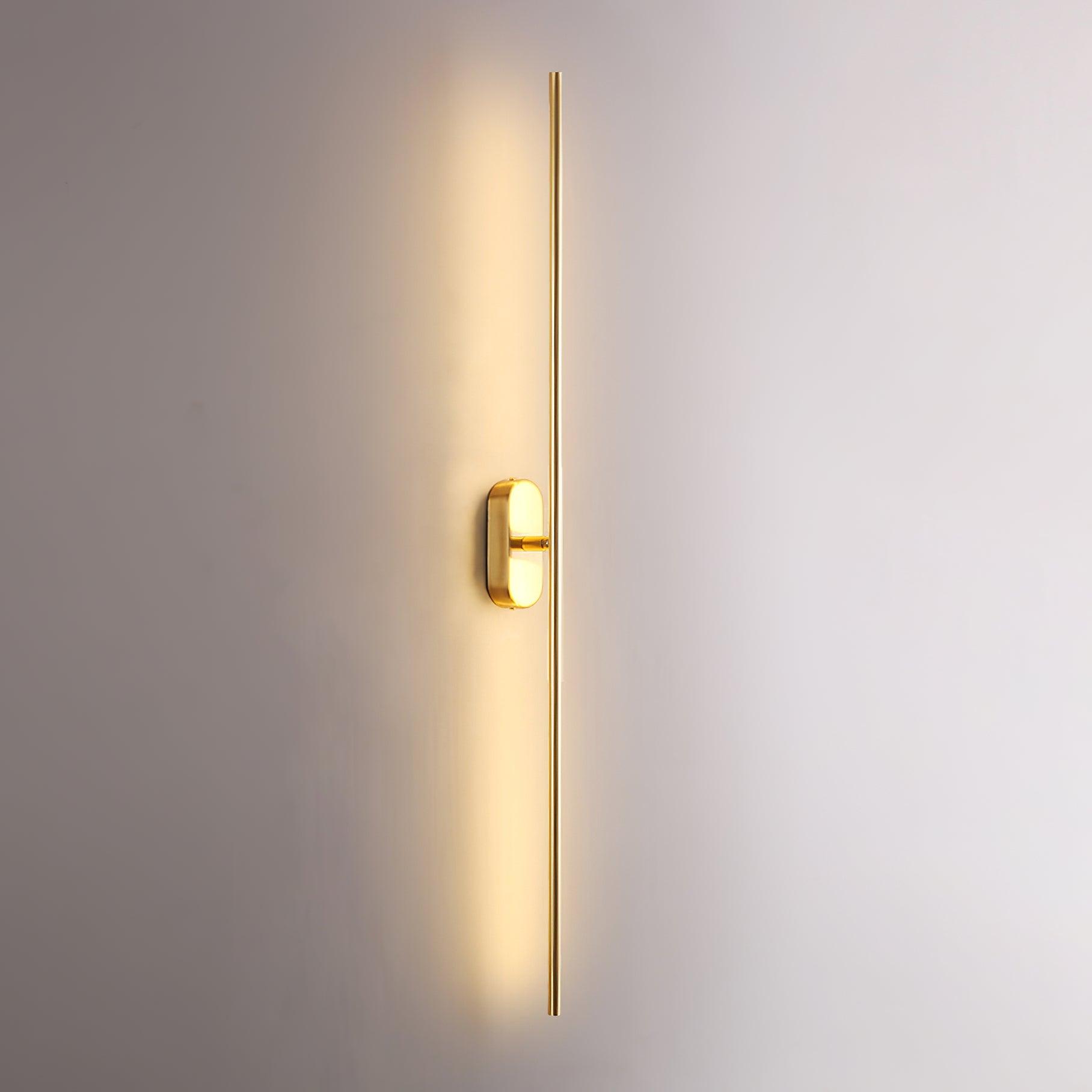 Slim wall sconce drawing a clean line of light upward
