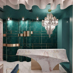 In a teal-tiled powder room with a marble vanity, this silver Clérachic chandelier hangs lit overhead.