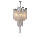 This lit silver Clérachic chandelier is shown on a plain backdrop, its chain fringe hanging in loose vertical strands.