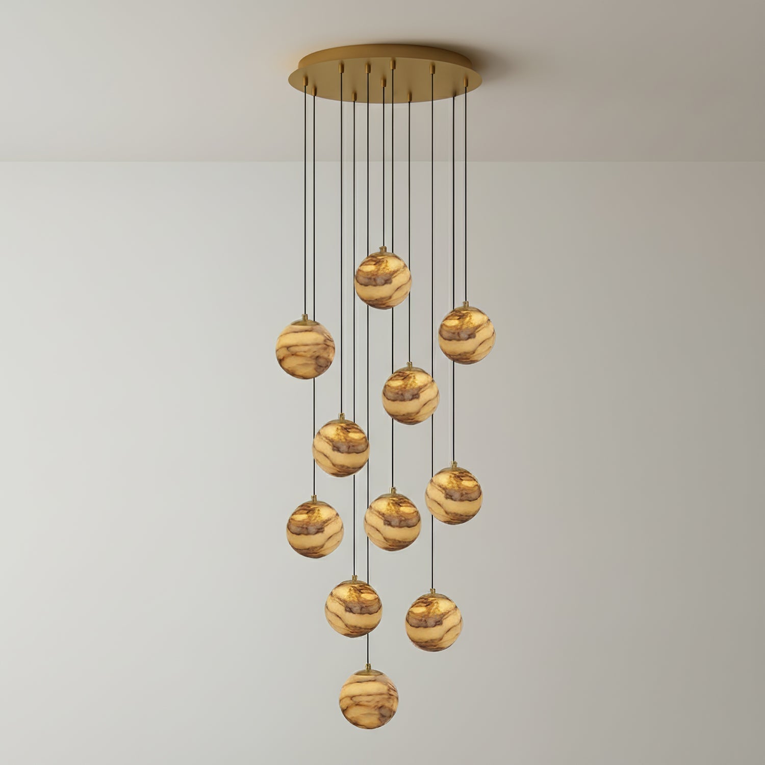 Twelve-light Sultana chandelier, alabaster globes cascading in a wide spiral from a gold ceiling plate.