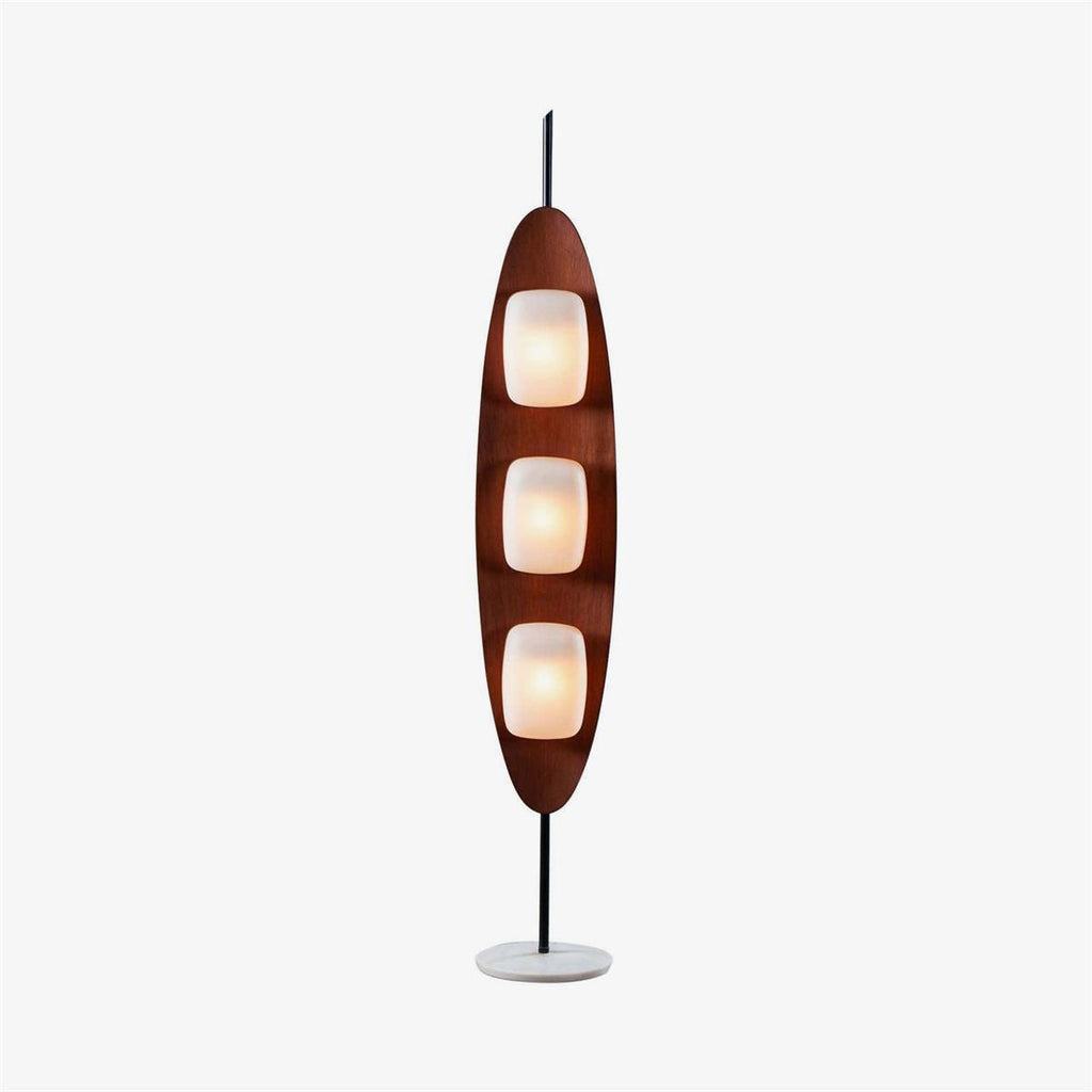 Clérachic teak-finish floor lamp with three stacked white glass shades, shown full length on a plain light studio backdrop.