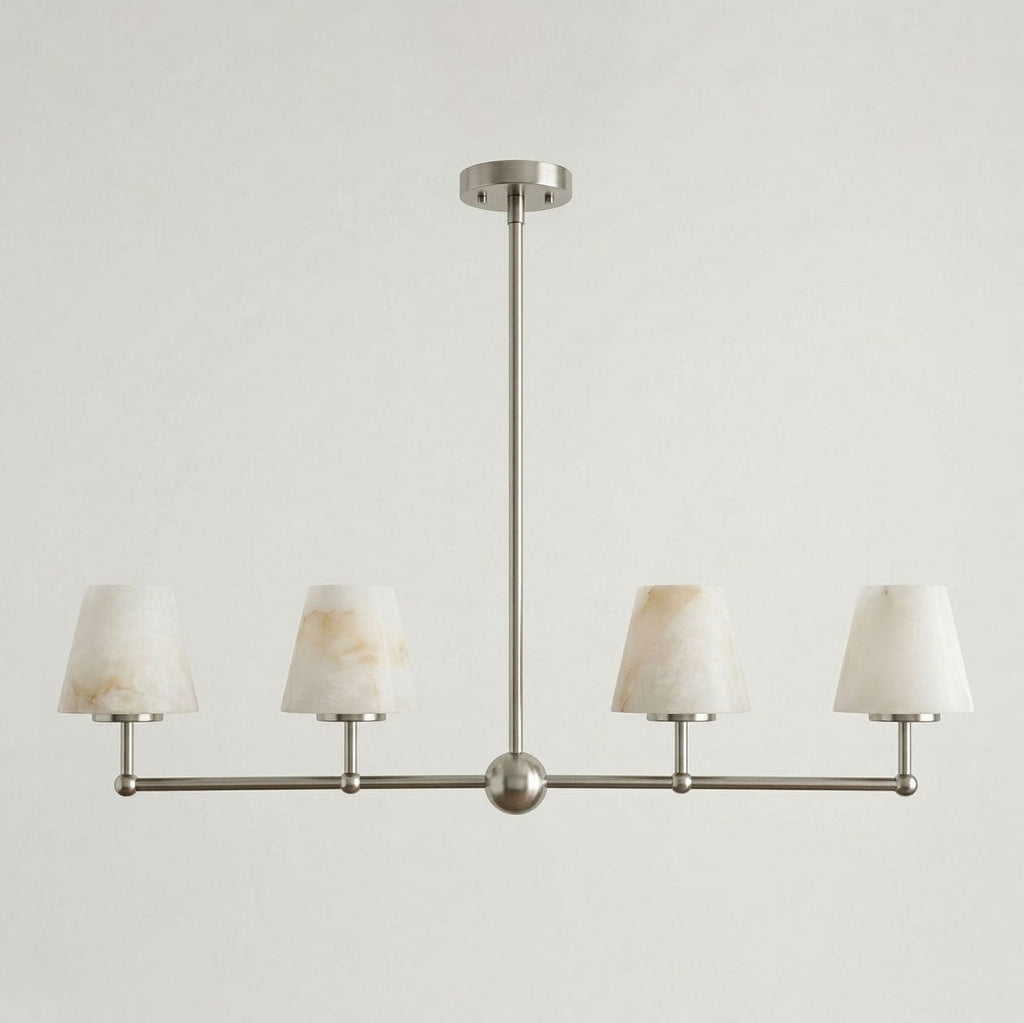 Seen straight-on against a plain background, this Clérachic chandelier's four cone shades sit in brushed nickel.