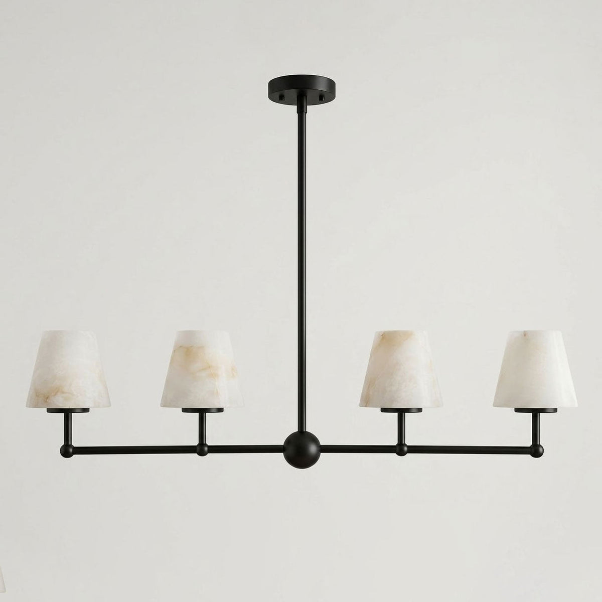 Shown alone on a plain backdrop, the straight bar and ball joints of this Clérachic chandelier appear in matte black.