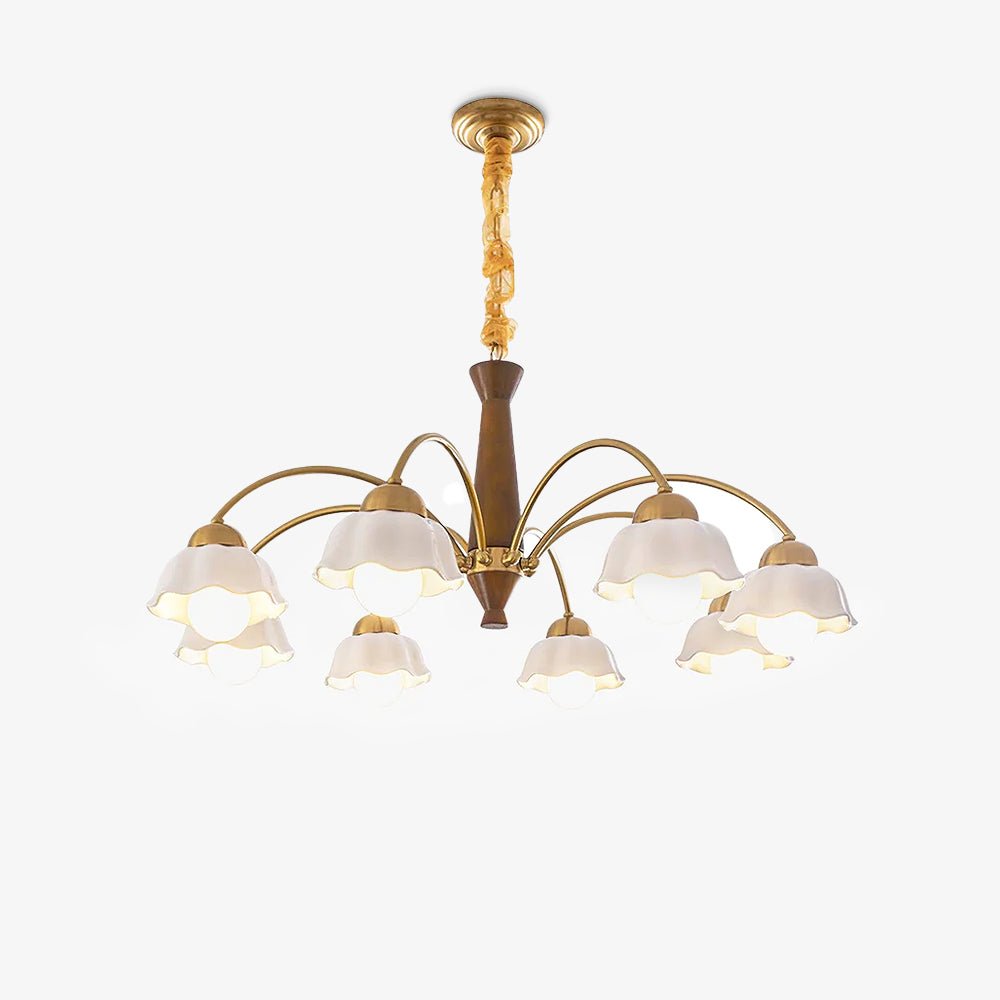Midcentury brass chandelier with opaline ceramic shades lit warmly