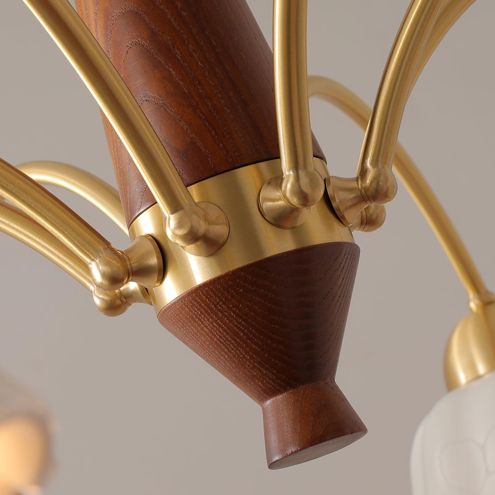 Swedish modern chandelier with ceramic shades in a cosy interior