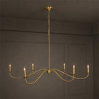 Studio view of this Clérachic chandelier in gold finish, its candle-style bulbs bare of any lampshade.