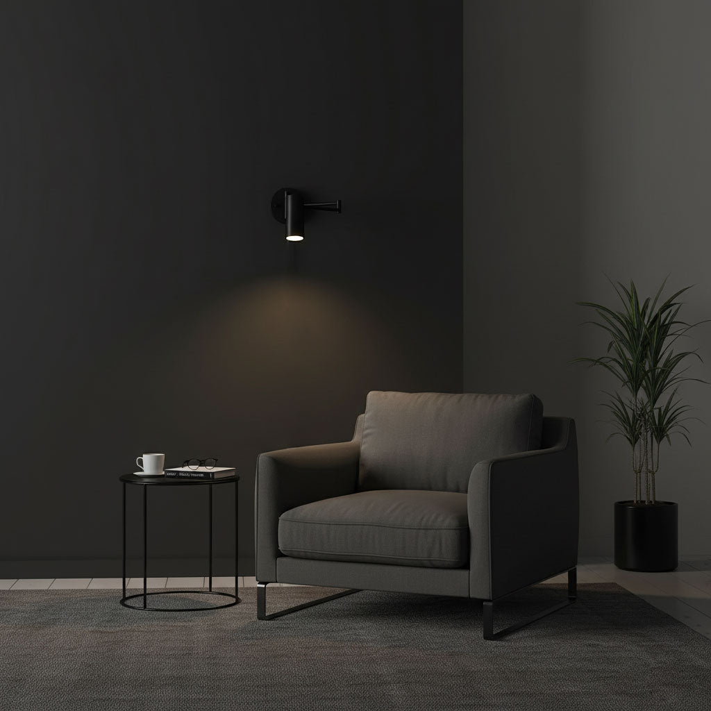 Gold swing arm wall sconce casting warm light on the wall