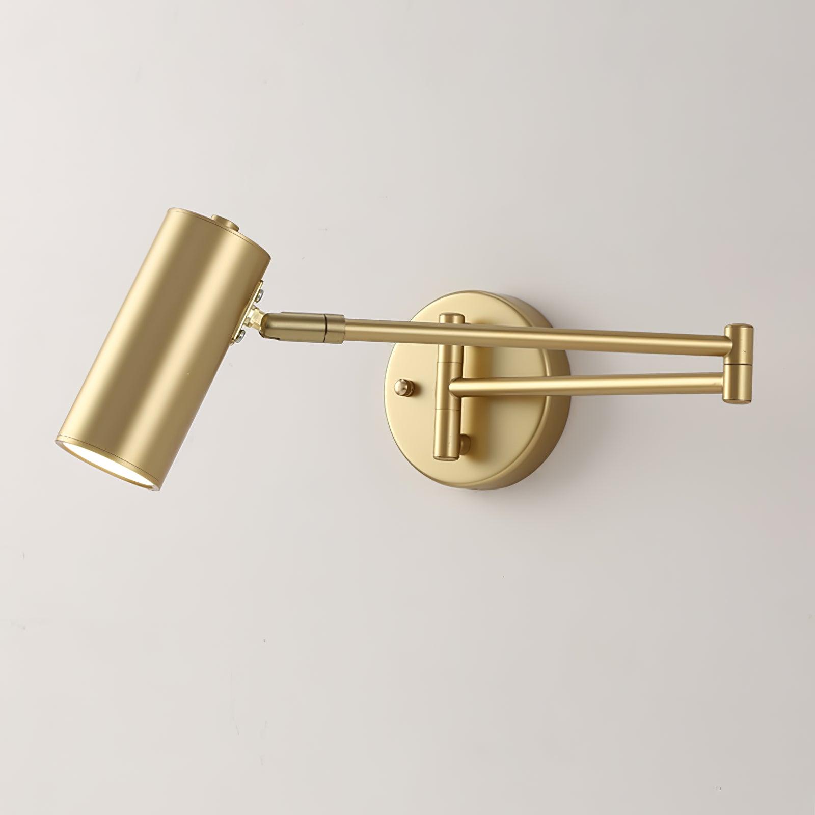 Swing arm wall sconce mounted beside a bed for reading