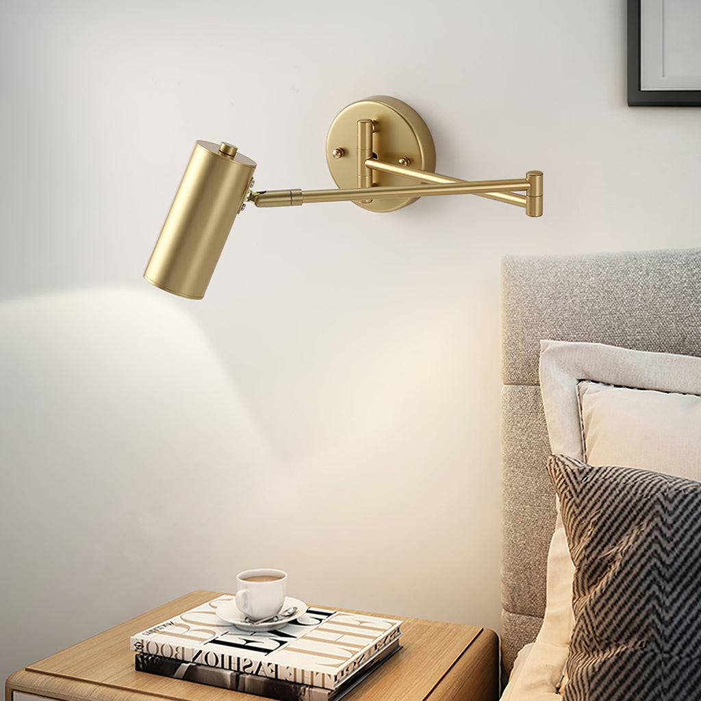 Black wall sconce arm and shade against a neutral wall