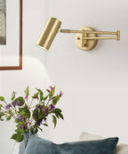 Swing arm wall sconce glowing gently in a styled living space