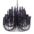 Swinton wood rod chandelier hanging in a modern interior