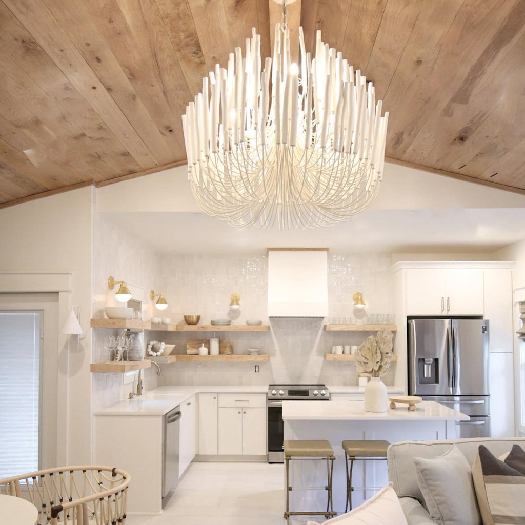 Swinton chandelier glowing over a relaxed living space
