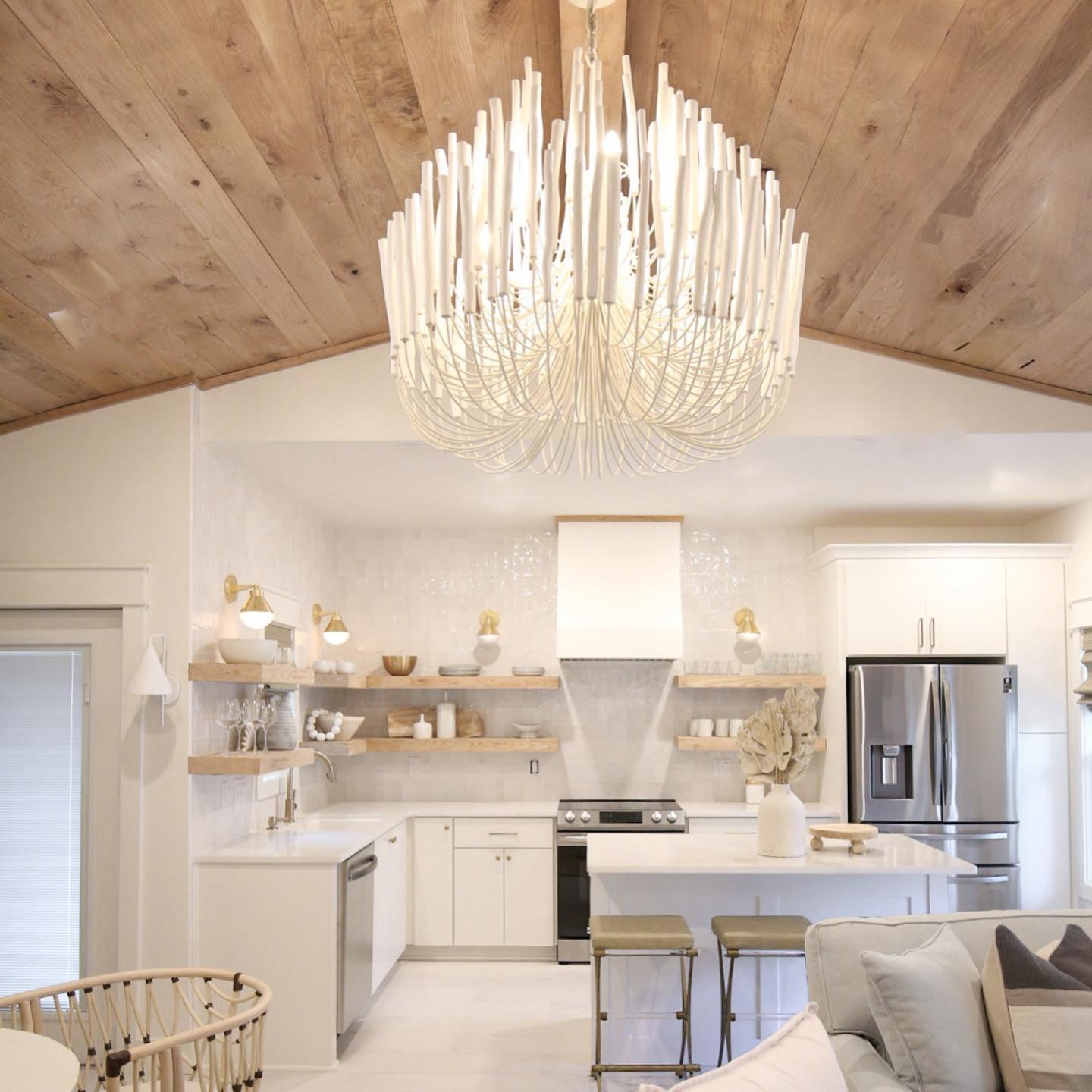 Swinton chandelier glowing over a relaxed living space