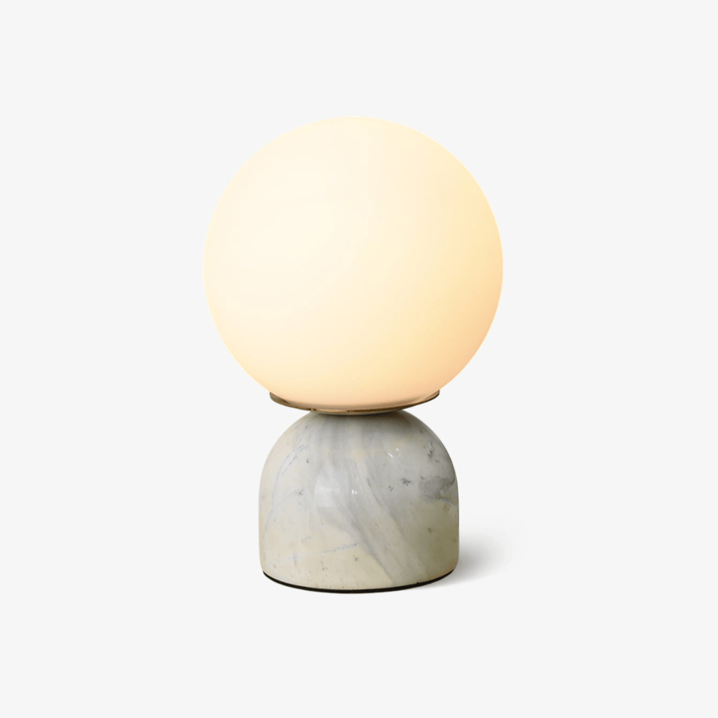 Marble table lamp with luminous white glass globe shade