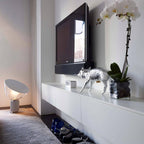 Table lamp with polished white bowl and clear glass diffuser