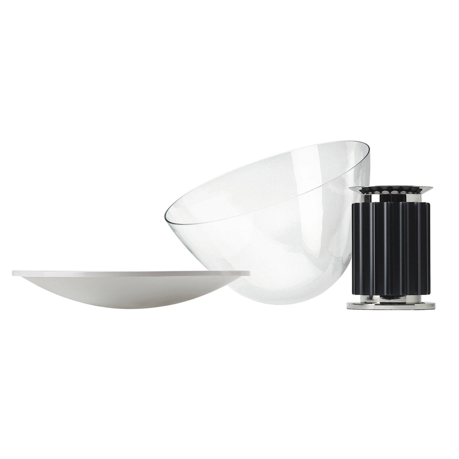 Modern white table lamp with curved reflector on shelf