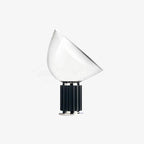 Table lamp with glossy aluminum reflector and blown glass diffuser