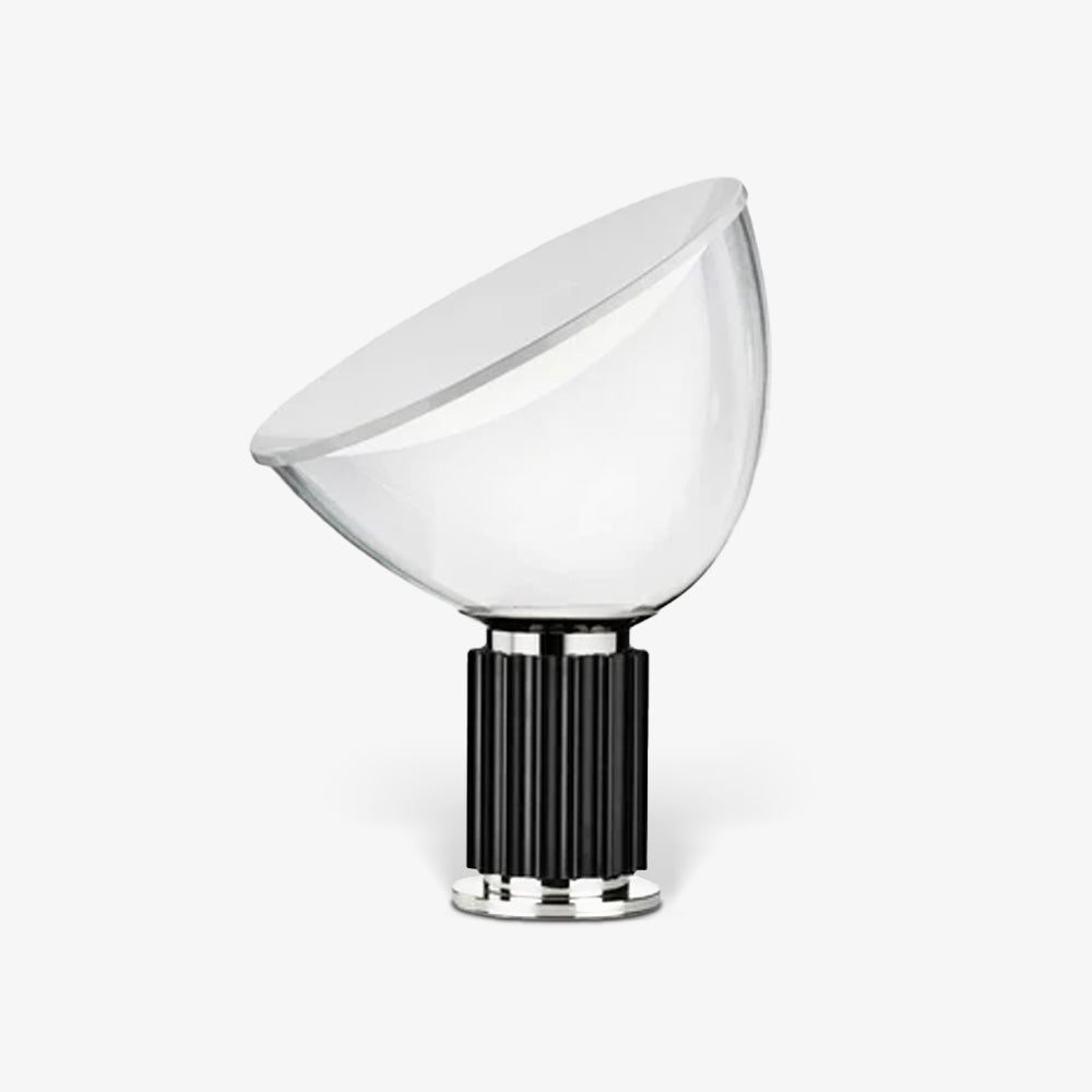 White reflector table lamp glowing warmly in interior setting