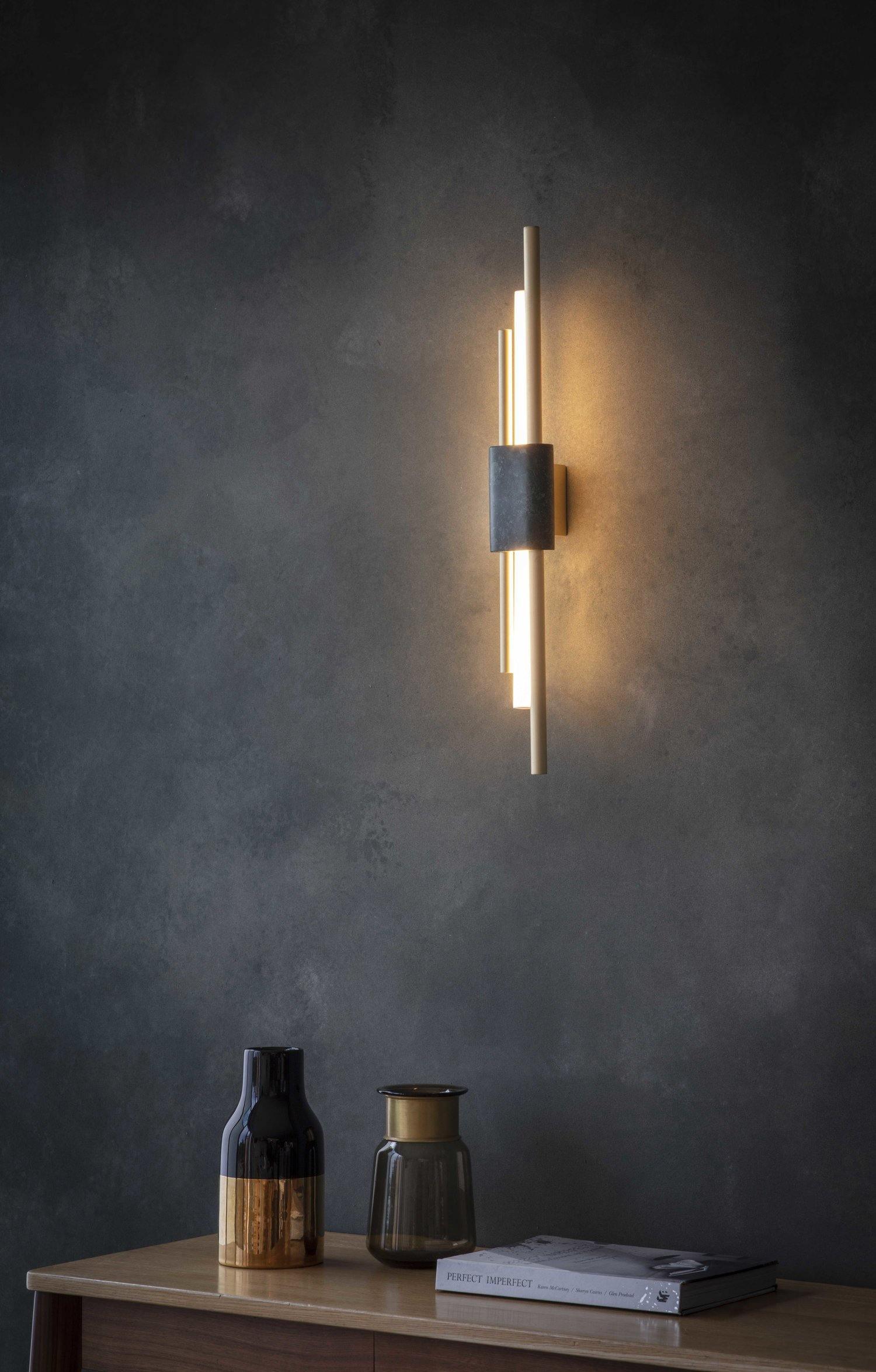 Marble and gold cylinder wall lamp with soft warm light