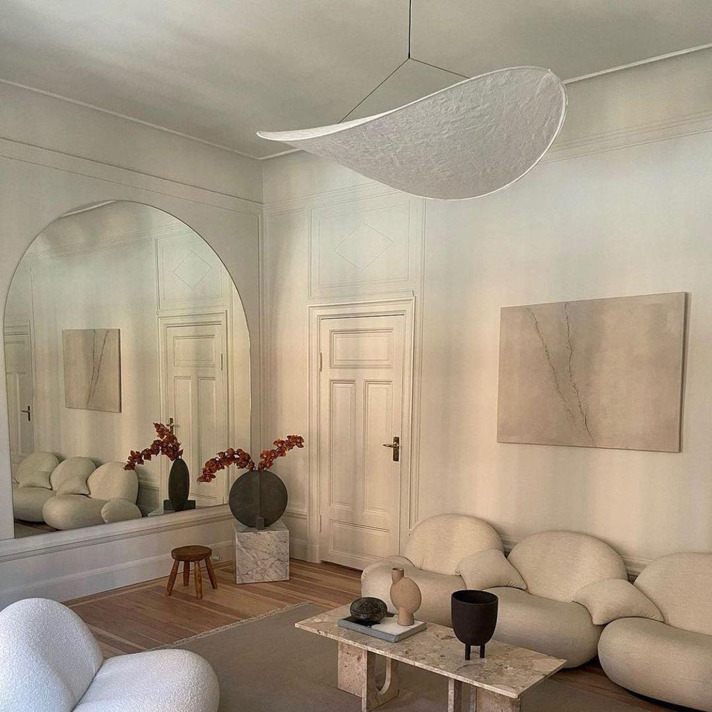 Mulberry silk pendant light shown from below glowing