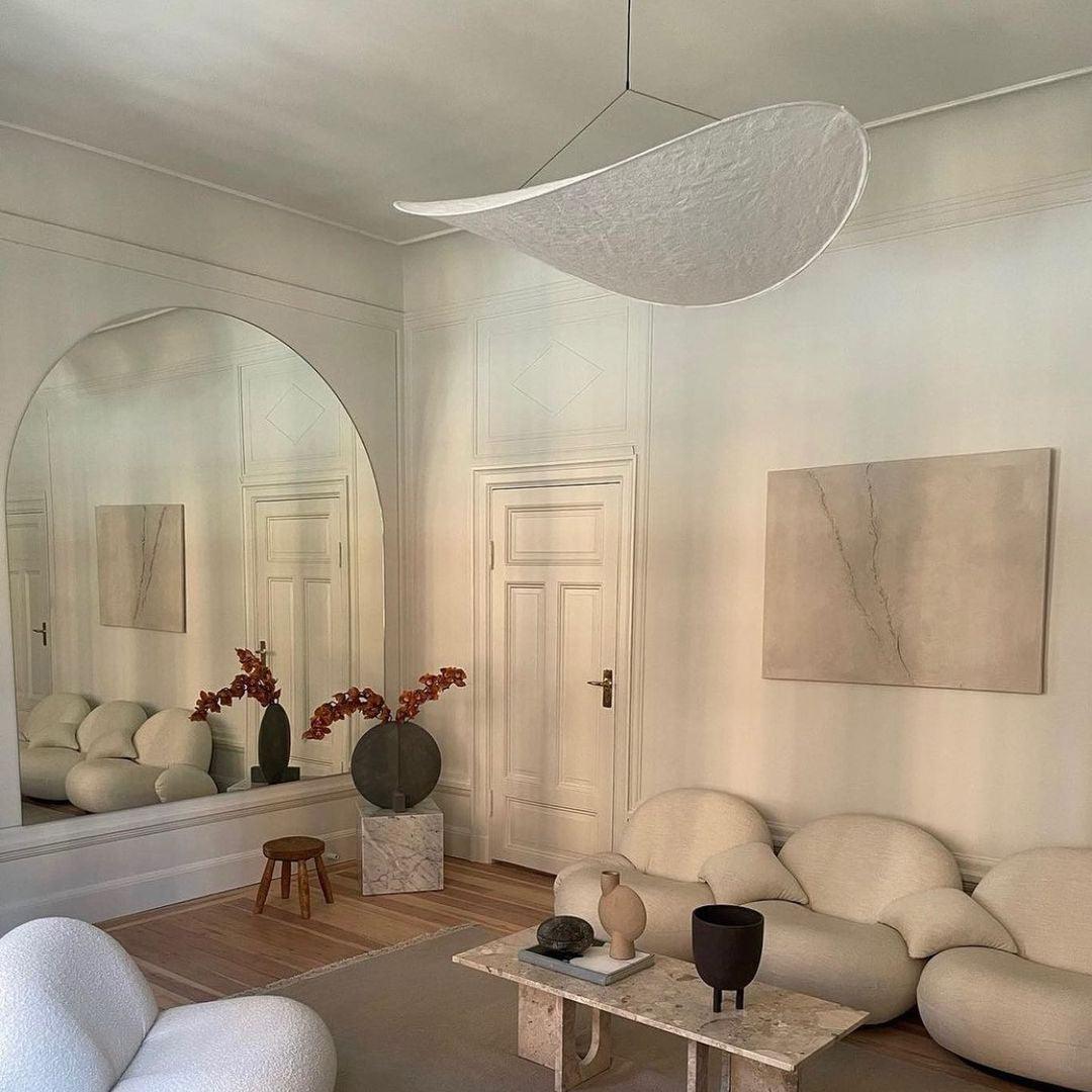 Mulberry silk pendant light shown from below glowing