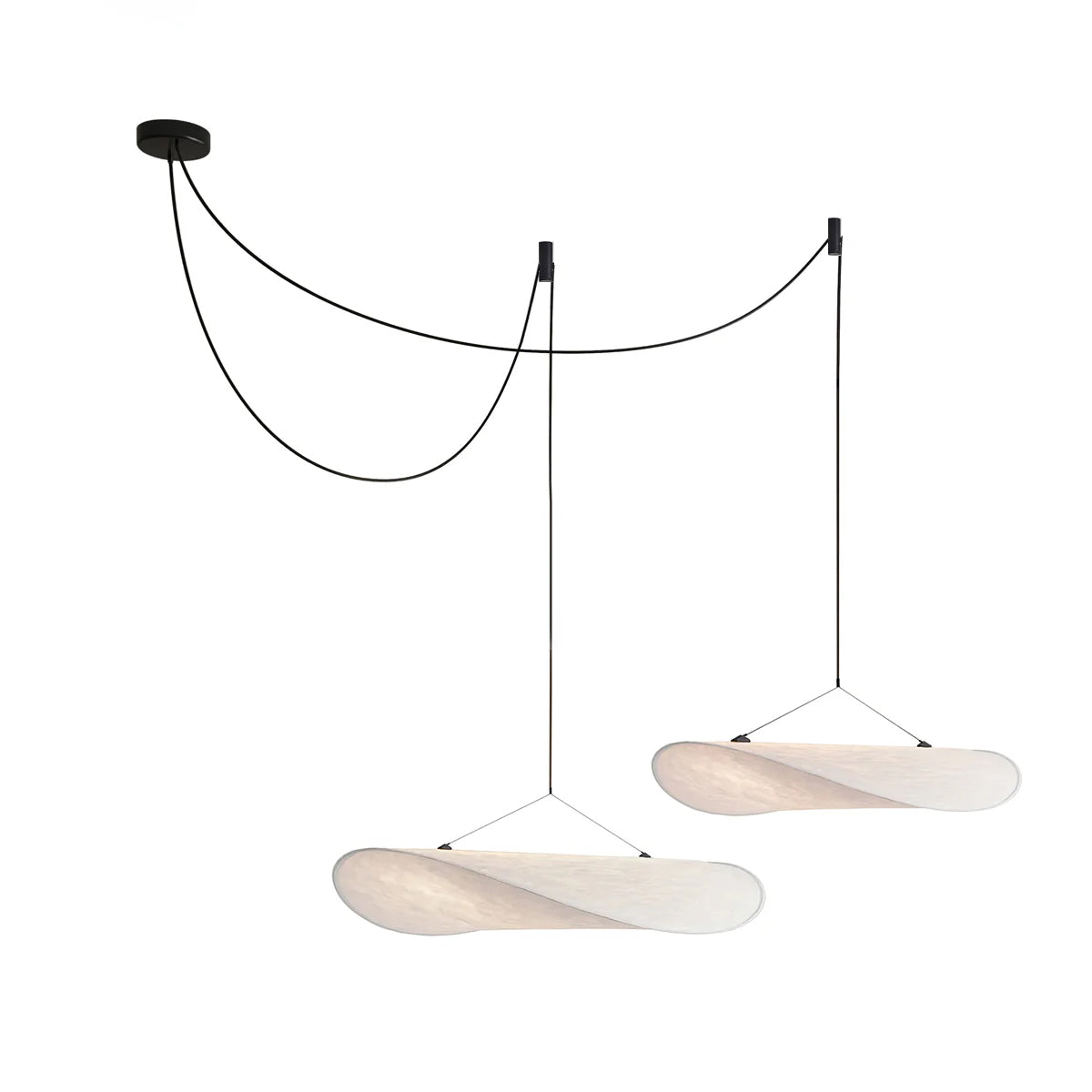 White paper pendant lamp shown against a plain studio wall