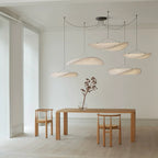 White and black Tyvek pendant lamp with a warm even glow