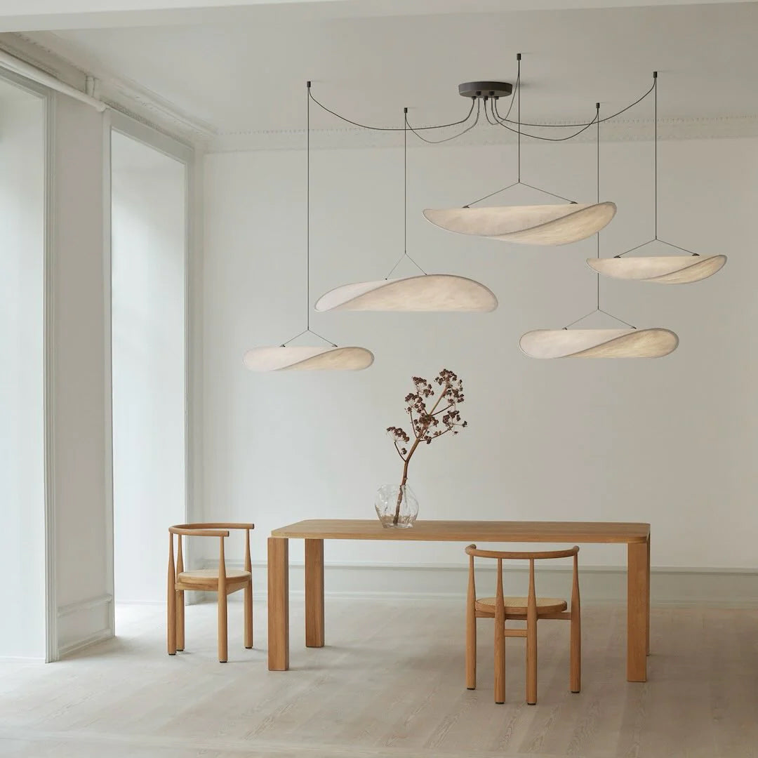 White and black Tyvek pendant lamp with a warm even glow