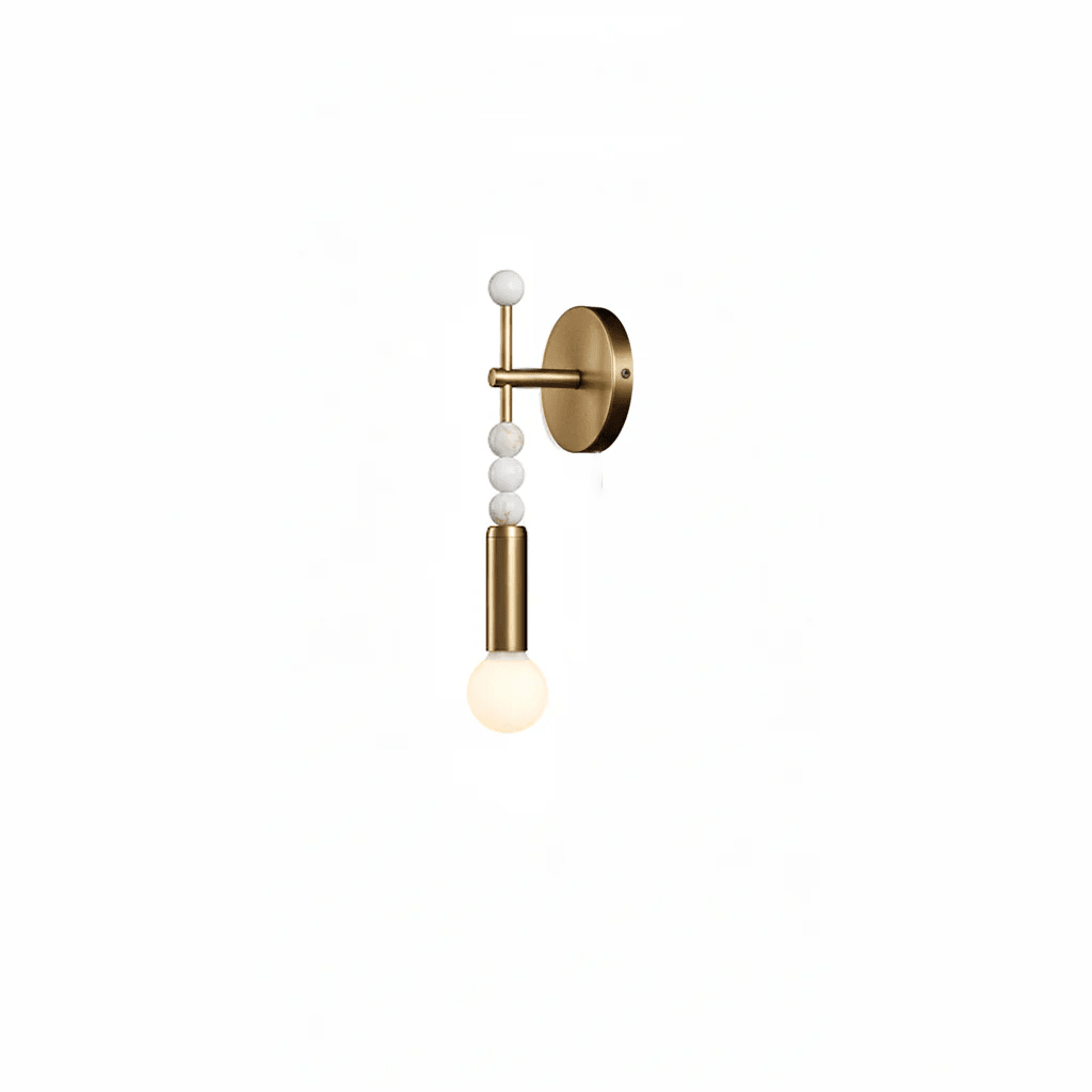 Antique brass wall lamp with green marble accent close up