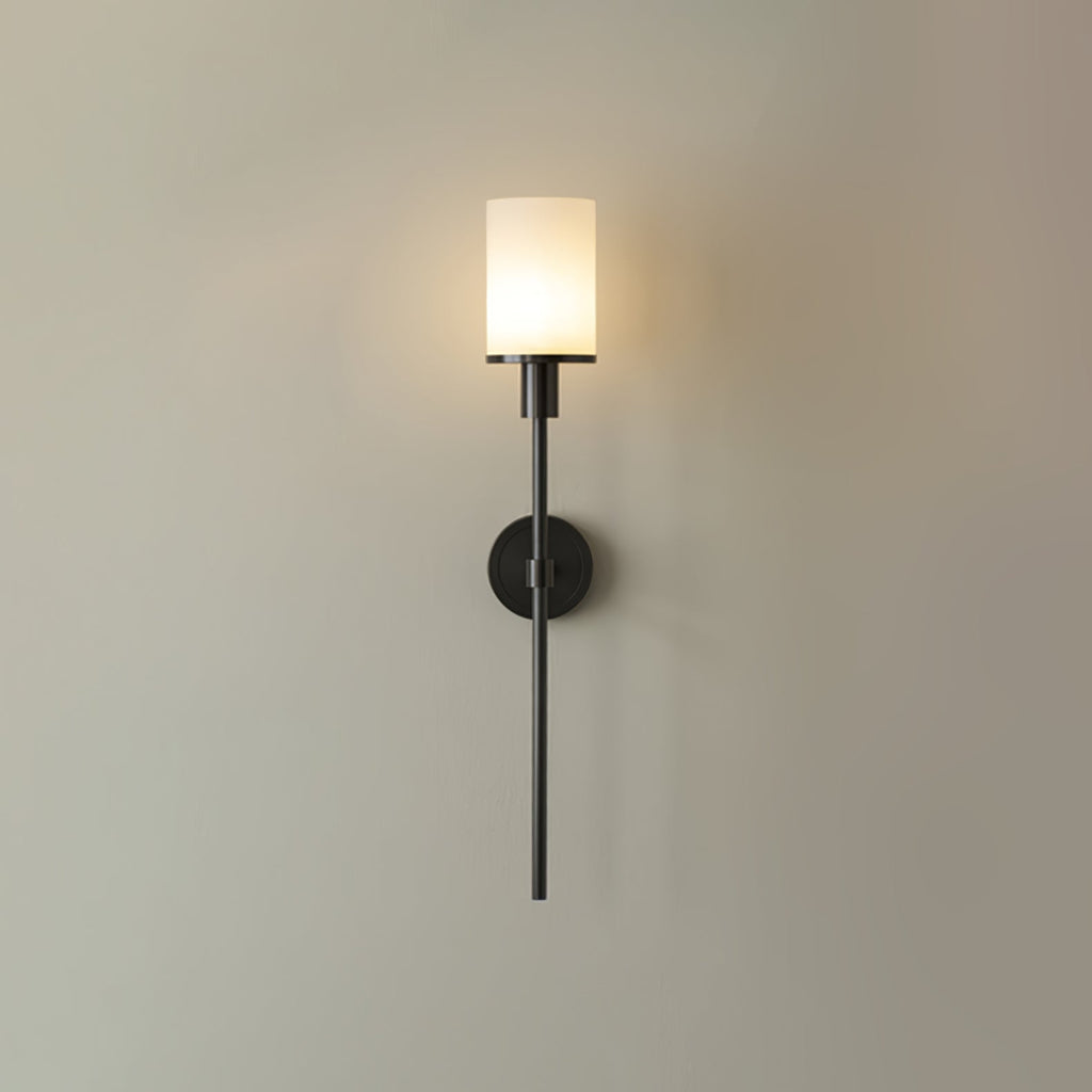 The Clérachic black-finish alabaster sconce seen head-on, its long slim rod running past the wall plate