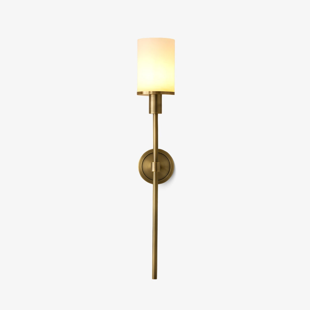 Clérachic brass alabaster wall sconce on a plain white background, whole fixture lit and shown end to end