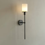 Clérachic gunmetal alabaster wall sconce viewed at an angle, showing how far the arm stands off the wall